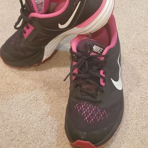Cute hot pink and black Nike tennis shoes